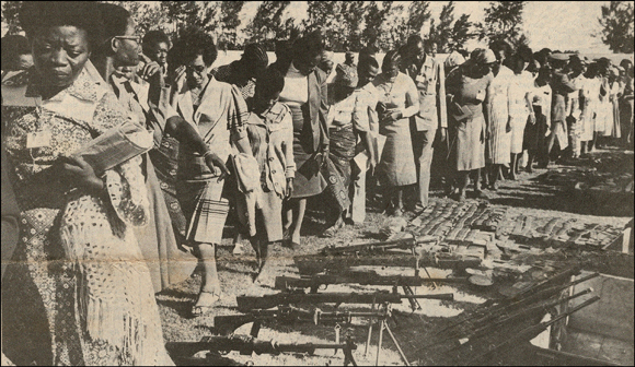 OMM delegates and captured weapons