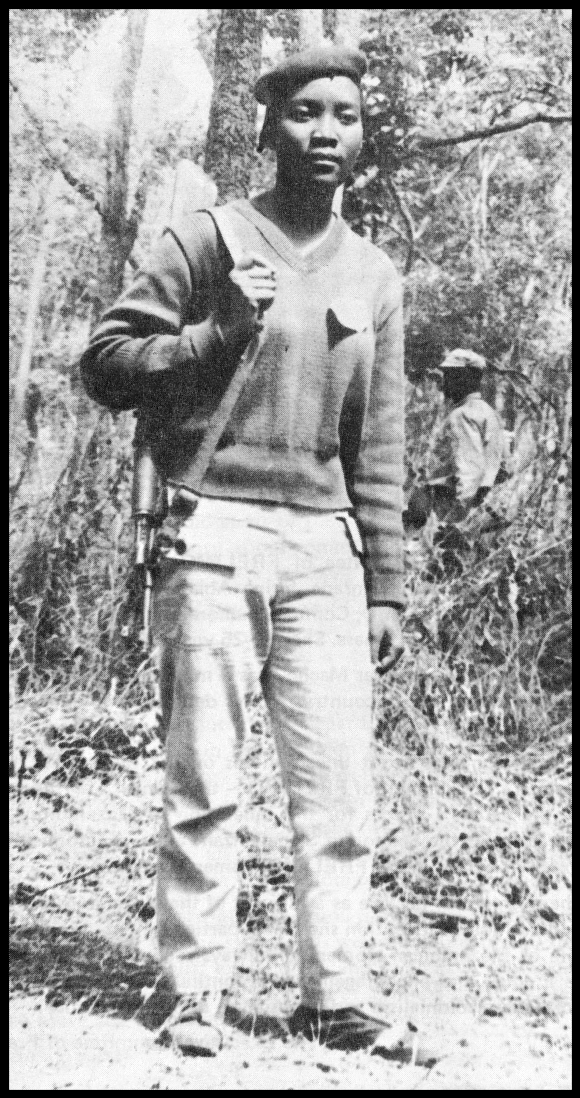 Josina Machel, with rifle