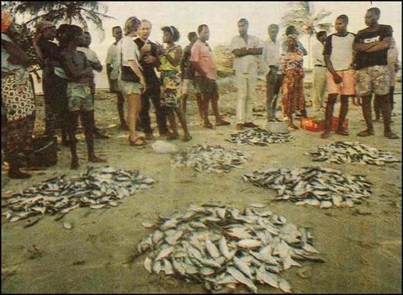 Fishermen displaying their catch