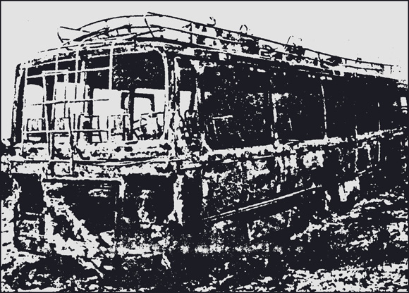 Burned out Oliveira bus near Taninga