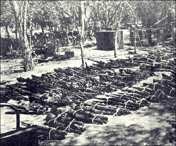 Bundles of captured Renamo weaponry